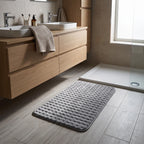 Alfombra de baño con topitos gris