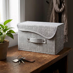 Caja plegable con asa y tapa con abrojo gris