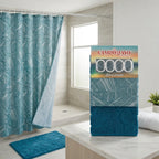Set de baño cortina estampada + ganchos + alfombra piedras CAMPOMAYO